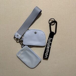Lululemon Dual Pouch Wristlet in Windmill/White and Black Wristlist